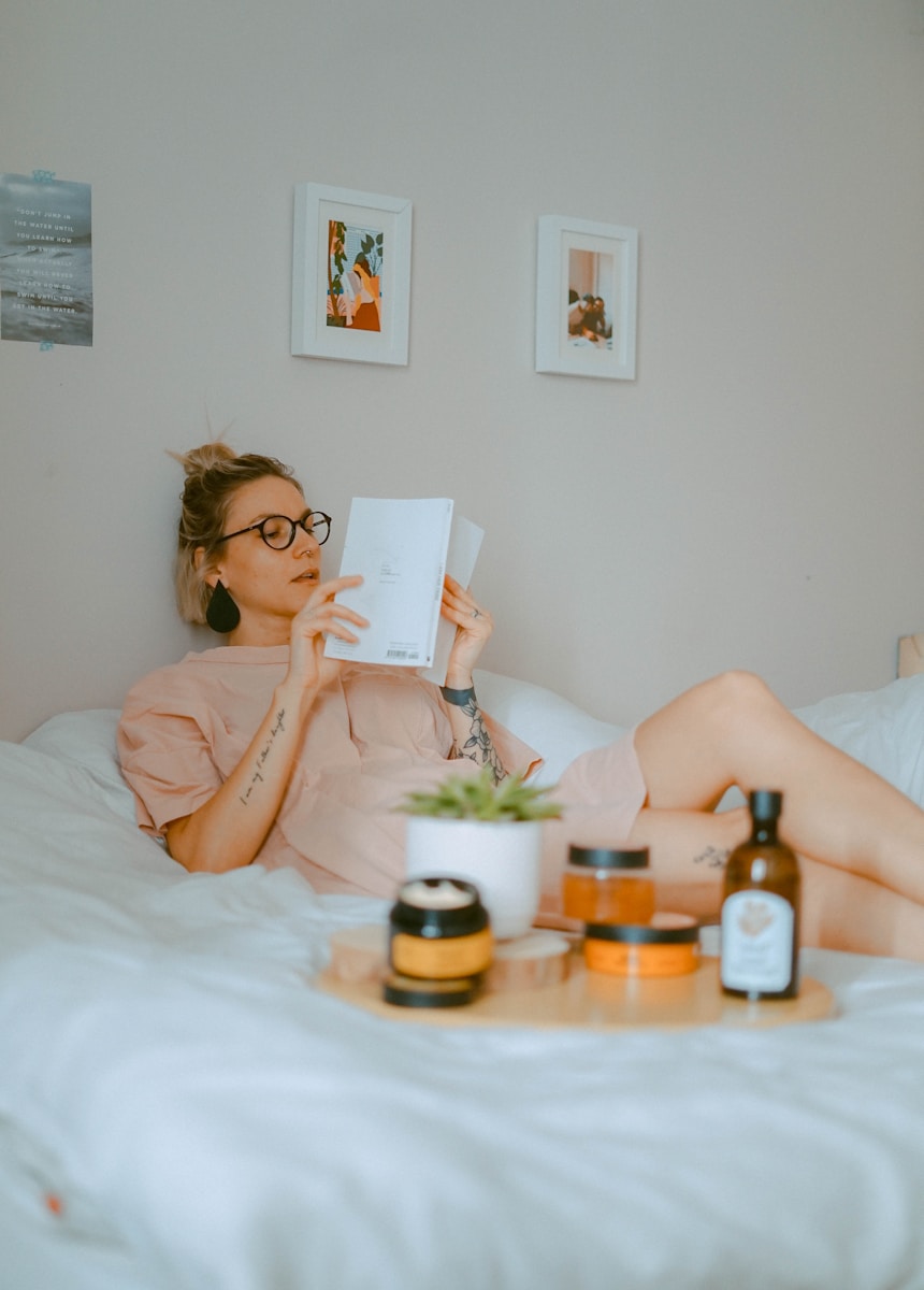 unknown person reading book indoors