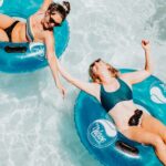 women on inflatable rings